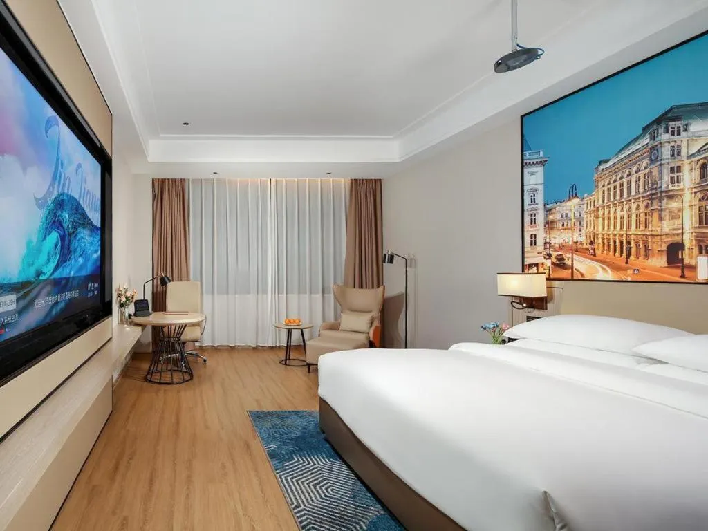 Bed in Vienna Hotel Shaanxi Xiianyang Yangling South Station