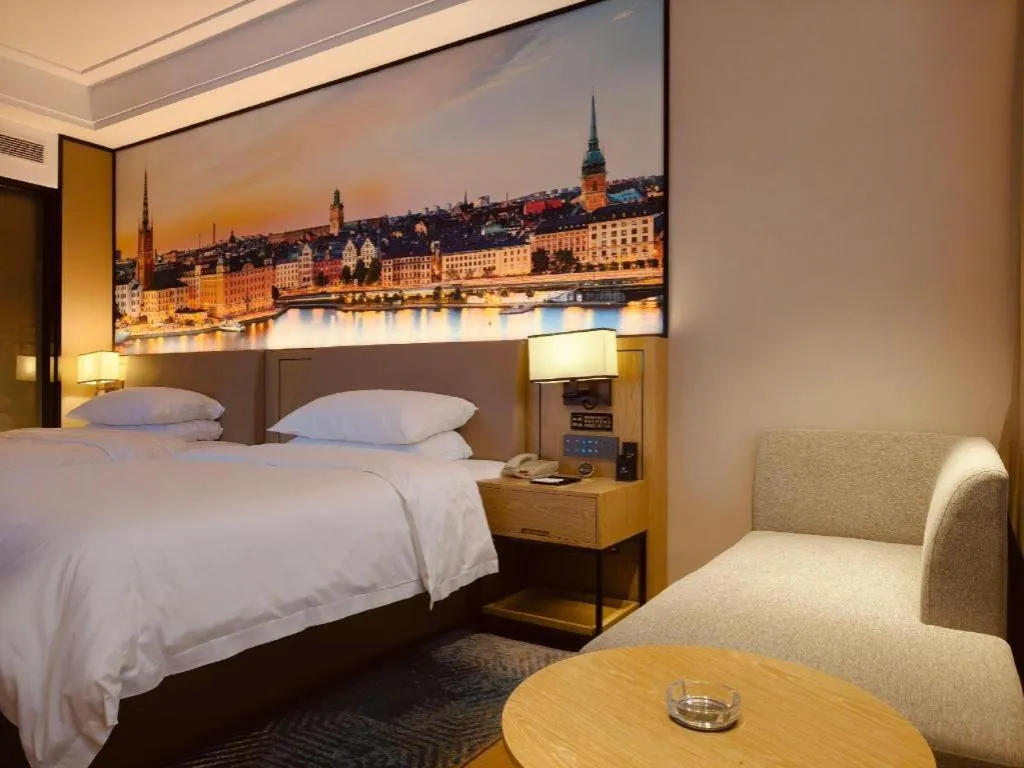 Bed in Vienna Hotel Shaanxi Xiianyang Yangling South Station