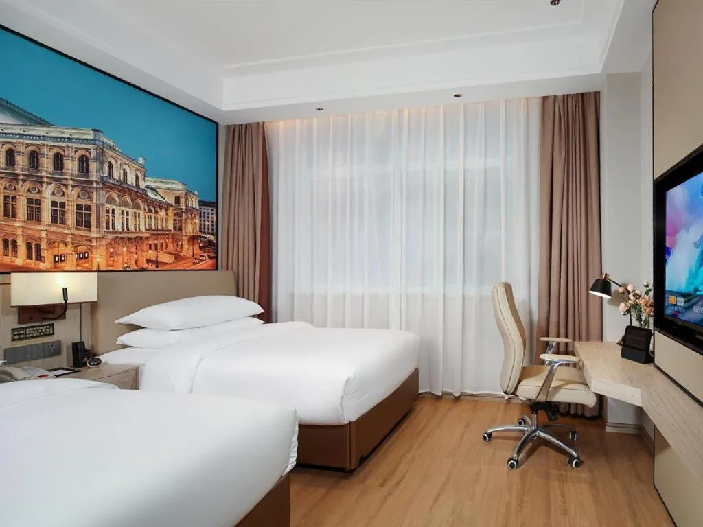 Bed in Vienna Hotel Shaanxi Xiianyang Yangling South Station