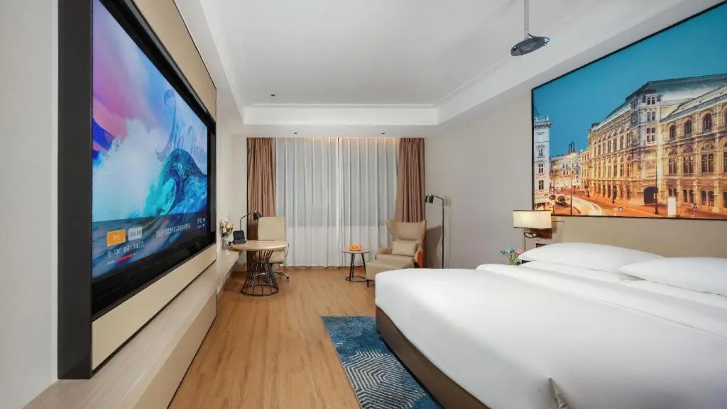 Bed in Vienna Hotel Shaanxi Xiianyang Yangling South Station