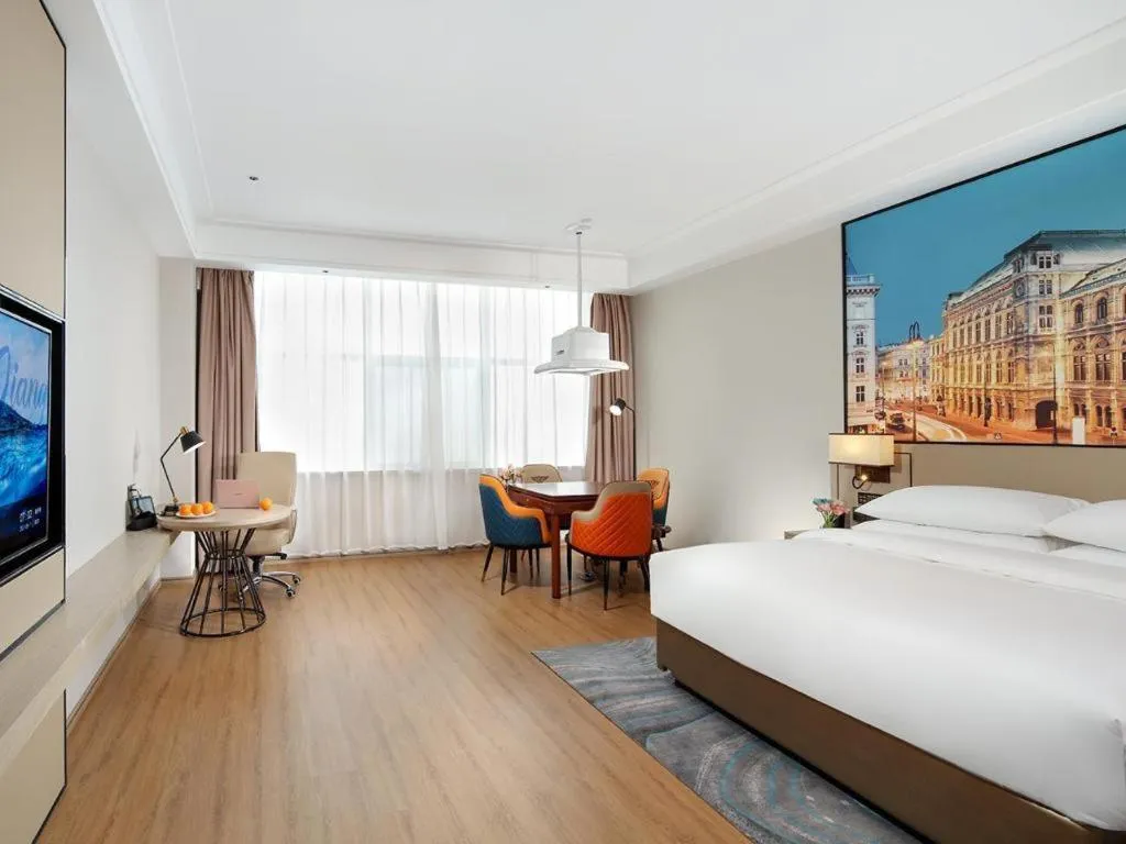 Bed in Vienna Hotel Shaanxi Xiianyang Yangling South Station