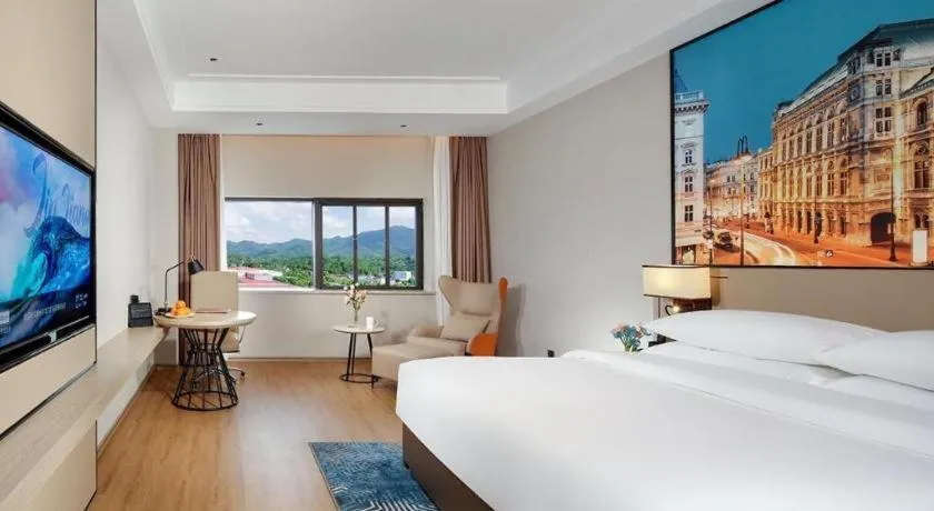 Bed in Vienna Hotel Shaanxi Xiianyang Yangling South Station