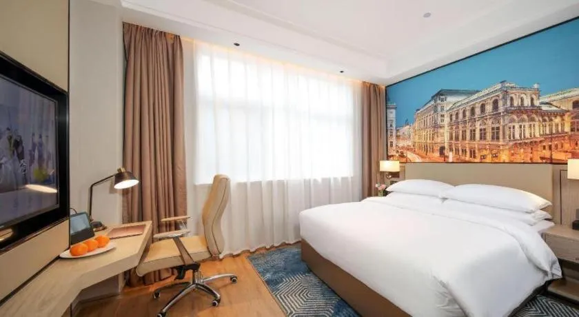 Bed in Vienna Hotel Shaanxi Xiianyang Yangling South Station
