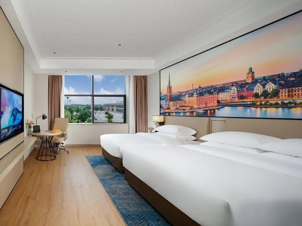 Bed in Vienna Hotel Shaanxi Xiianyang Yangling South Station