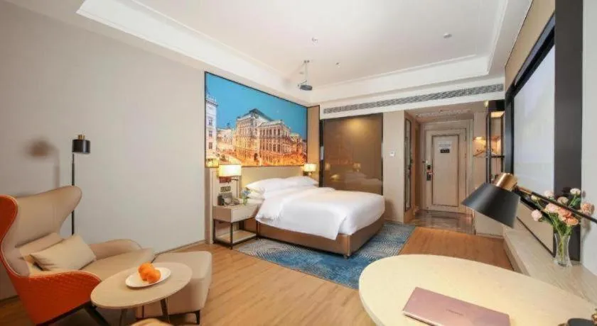 Bed in Vienna Hotel Shaanxi Xiianyang Yangling South Station