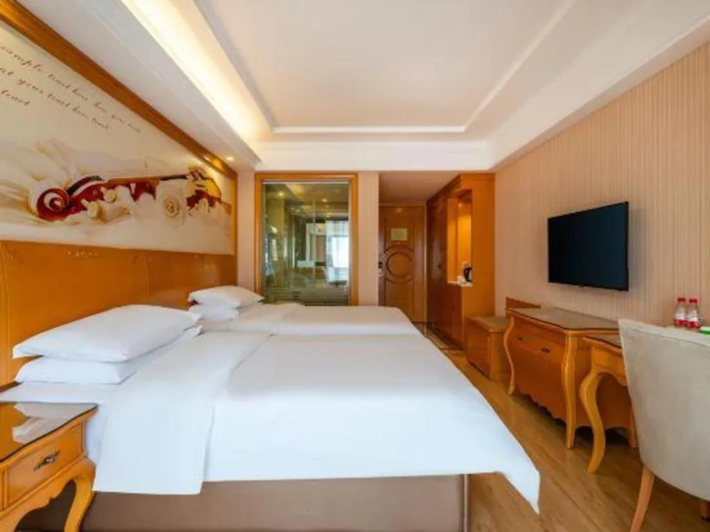 Bed in Vienna Hotel Chongqing West Station Southwesten Hospital