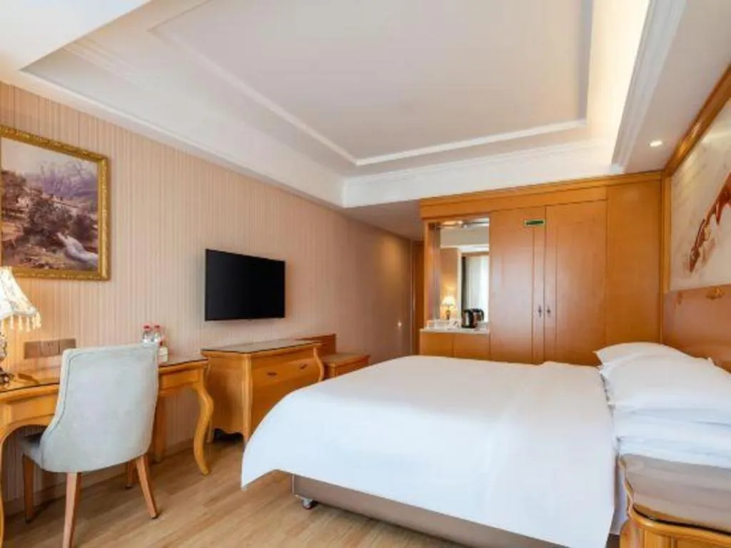 Bed in Vienna Hotel Chongqing West Station Southwesten Hospital