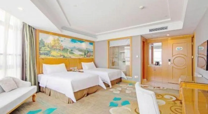 Bed in Vienna Hotel Guangdong Zhongshan Ancient Town Haizhou