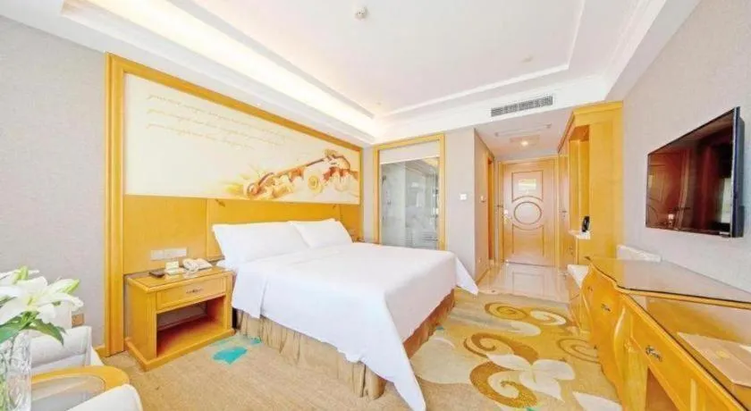 Bed in Vienna Hotel Guangdong Zhongshan Ancient Town Haizhou