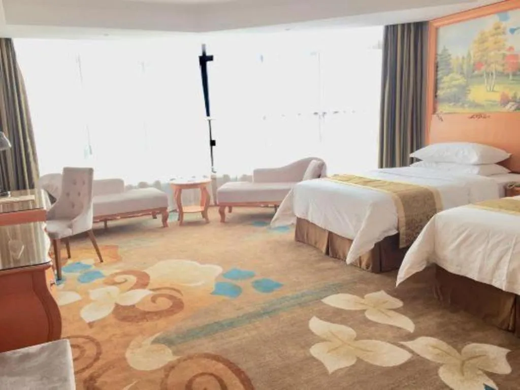 Bed in Vienna Hotel Guangdong Zhongshan Ancient Town Haizhou