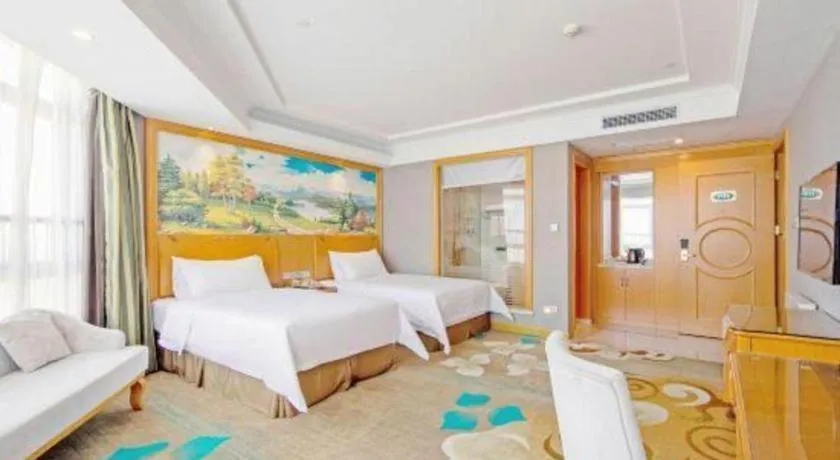 Bed in Vienna Hotel Guangdong Zhongshan Ancient Town Haizhou