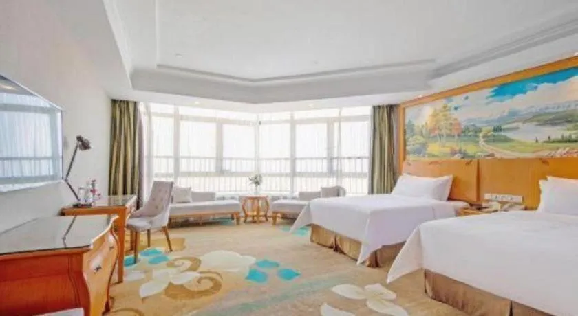 Bed in Vienna Hotel Guangdong Zhongshan Ancient Town Haizhou