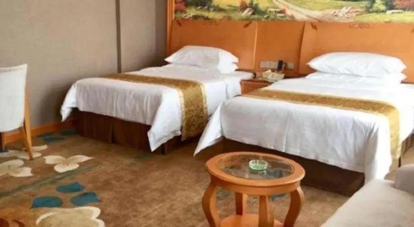 Bed in Vienna Hotel Guangdong Zhongshan Ancient Town Haizhou