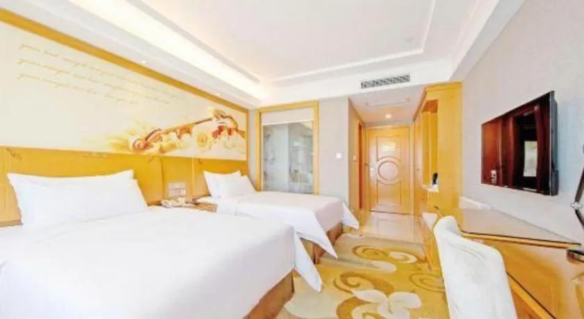 Bed in Vienna Hotel Guangdong Zhongshan Ancient Town Haizhou