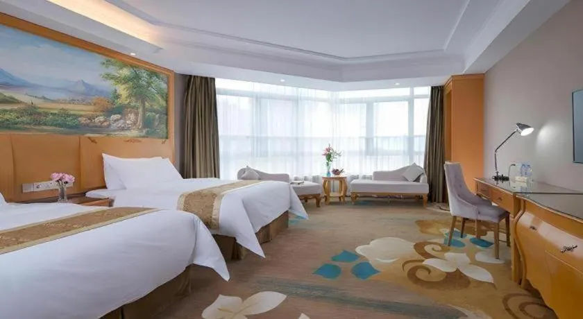 Bed in Vienna Hotel Guangdong Zhongshan Ancient Town Haizhou