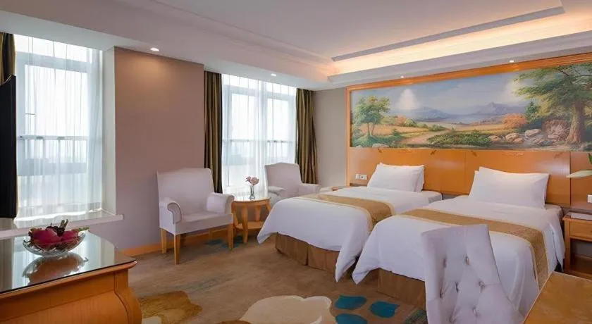 Bed in Vienna Hotel Guangdong Zhongshan Ancient Town Haizhou