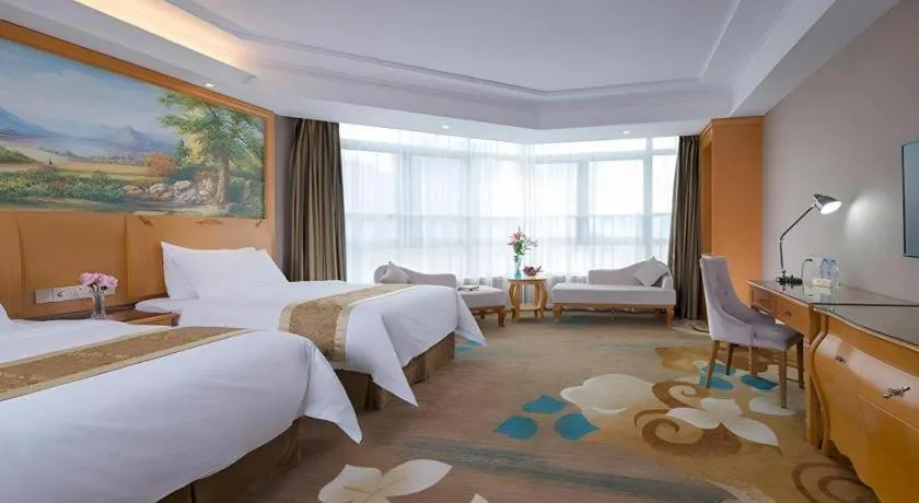 Bed in Vienna Hotel Guangdong Zhongshan Ancient Town Haizhou