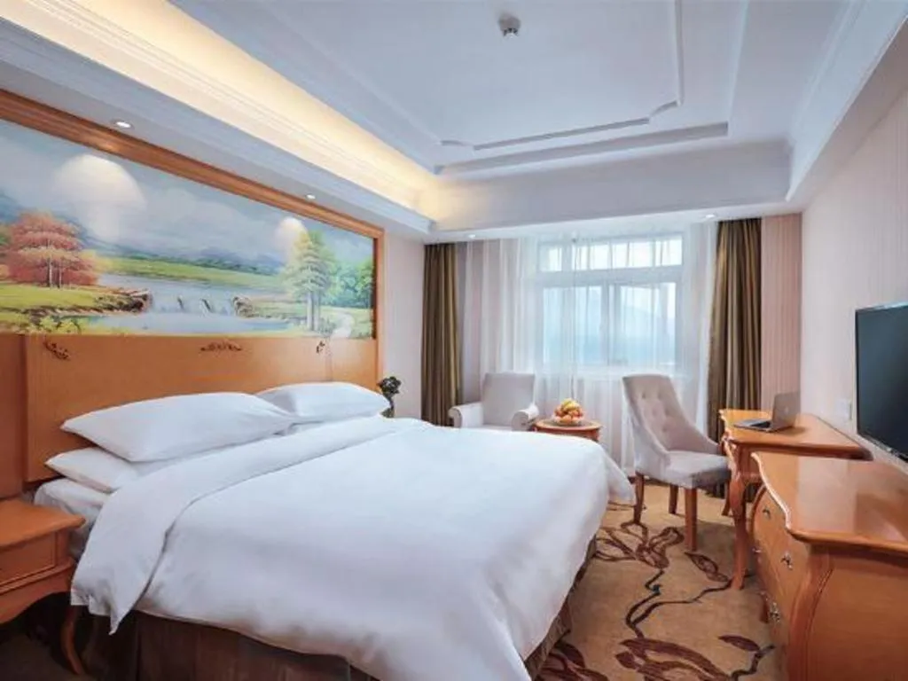 Bed in Vienna Hotel Guangdong Zhongshan Ancient Town Haizhou