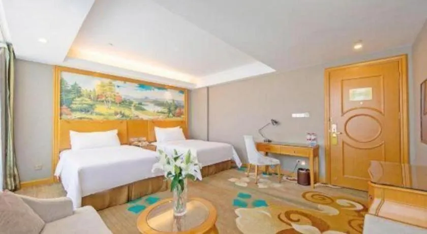 Bed in Vienna Hotel Guangdong Zhongshan Ancient Town Haizhou