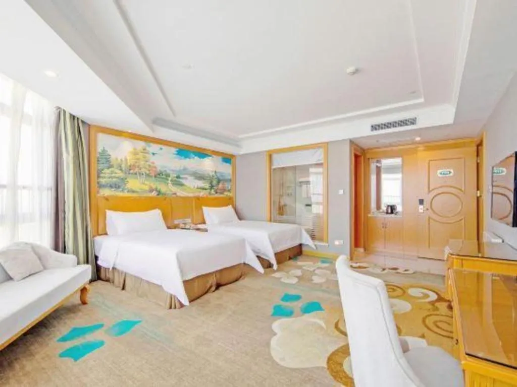 Bed in Vienna Hotel Guangdong Zhongshan Ancient Town Haizhou