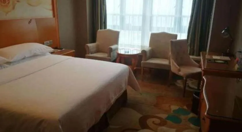 Bed in Vienna Hotel Guangdong Zhongshan Ancient Town Haizhou