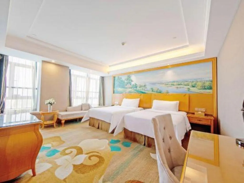 Bed in Vienna Hotel Guangdong Zhongshan Ancient Town Haizhou