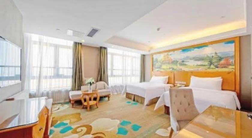Bed in Vienna Hotel Guangdong Zhongshan Ancient Town Haizhou