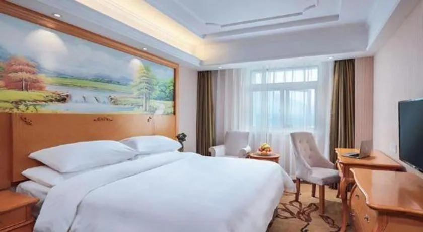 Bed in Vienna Hotel Guangdong Zhongshan Ancient Town Haizhou
