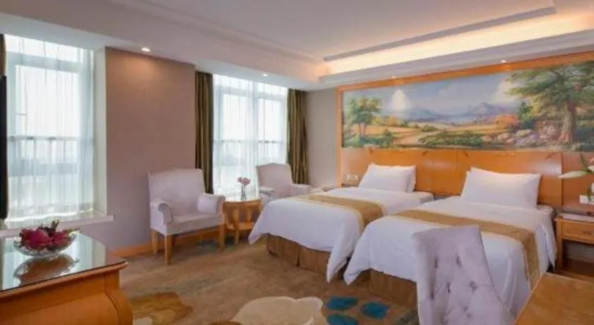 Bed in Vienna Hotel Guangdong Zhongshan Ancient Town Haizhou