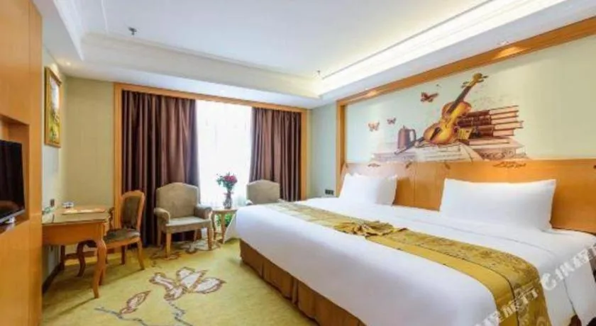 Bed in Vienna Hotel Nanning Anji Wanda 33rd Middle School Metro Station
