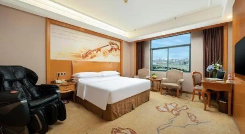 Bed in Vienna Hotel Nanning Anji Wanda 33rd Middle School Metro Station