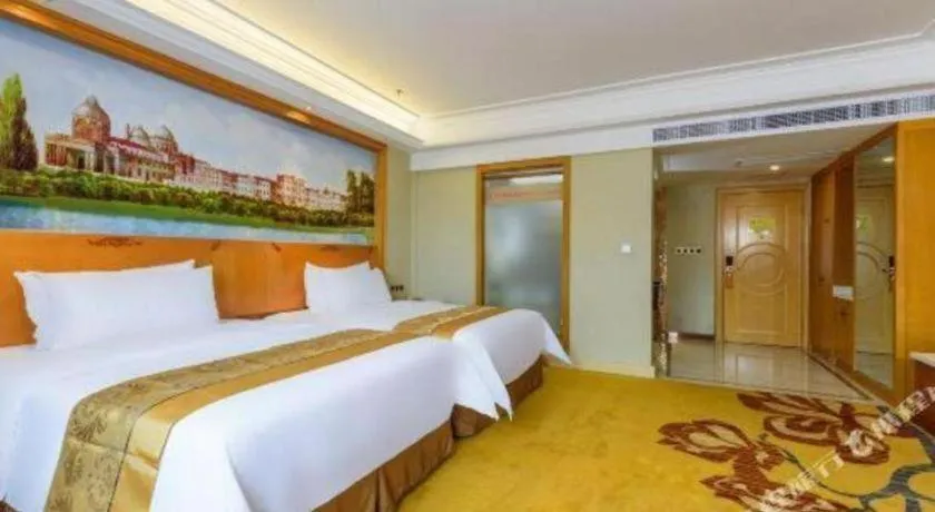 Bed in Vienna Hotel Nanning Anji Wanda 33rd Middle School Metro Station