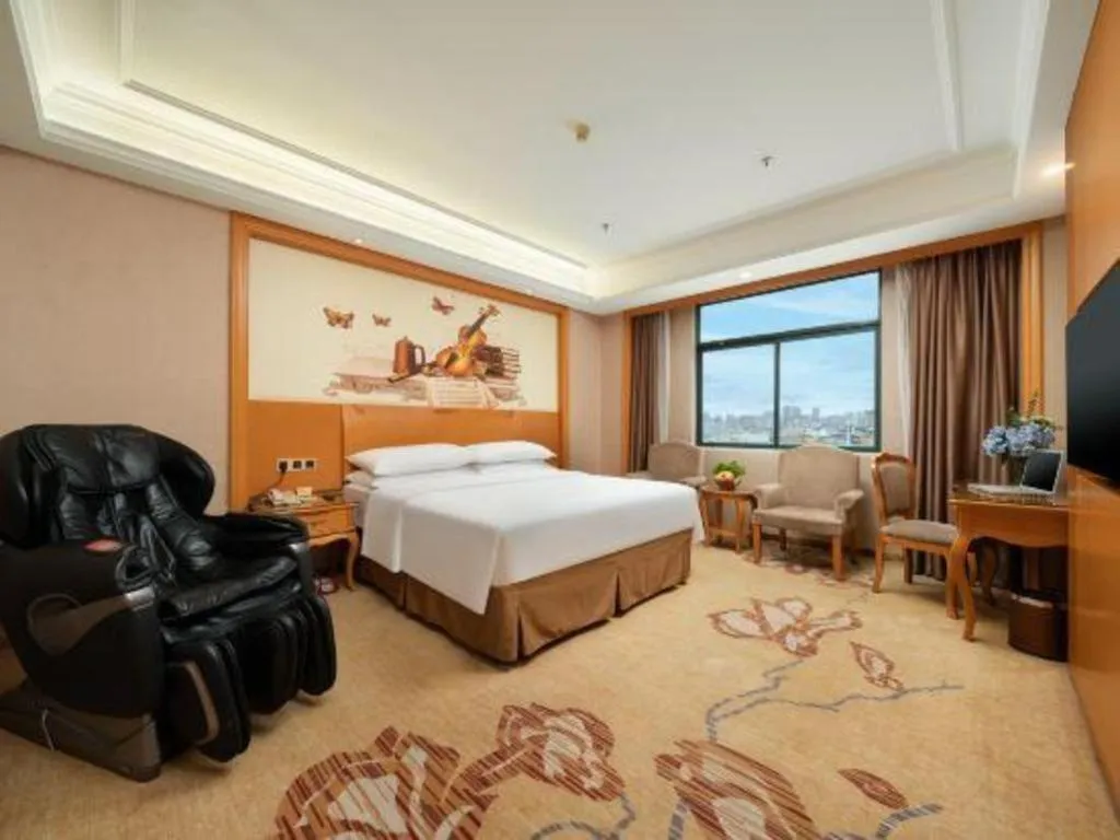 Bed in Vienna Hotel Nanning Anji Wanda 33rd Middle School Metro Station