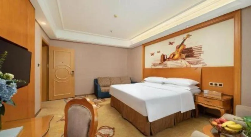 Bed in Vienna Hotel Nanning Anji Wanda 33rd Middle School Metro Station