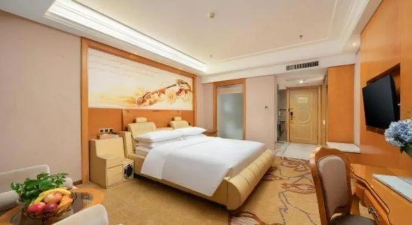Bed in Vienna Hotel Nanning Anji Wanda 33rd Middle School Metro Station