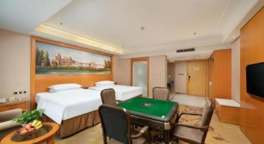 Bed in Vienna Hotel Nanning Anji Wanda 33rd Middle School Metro Station