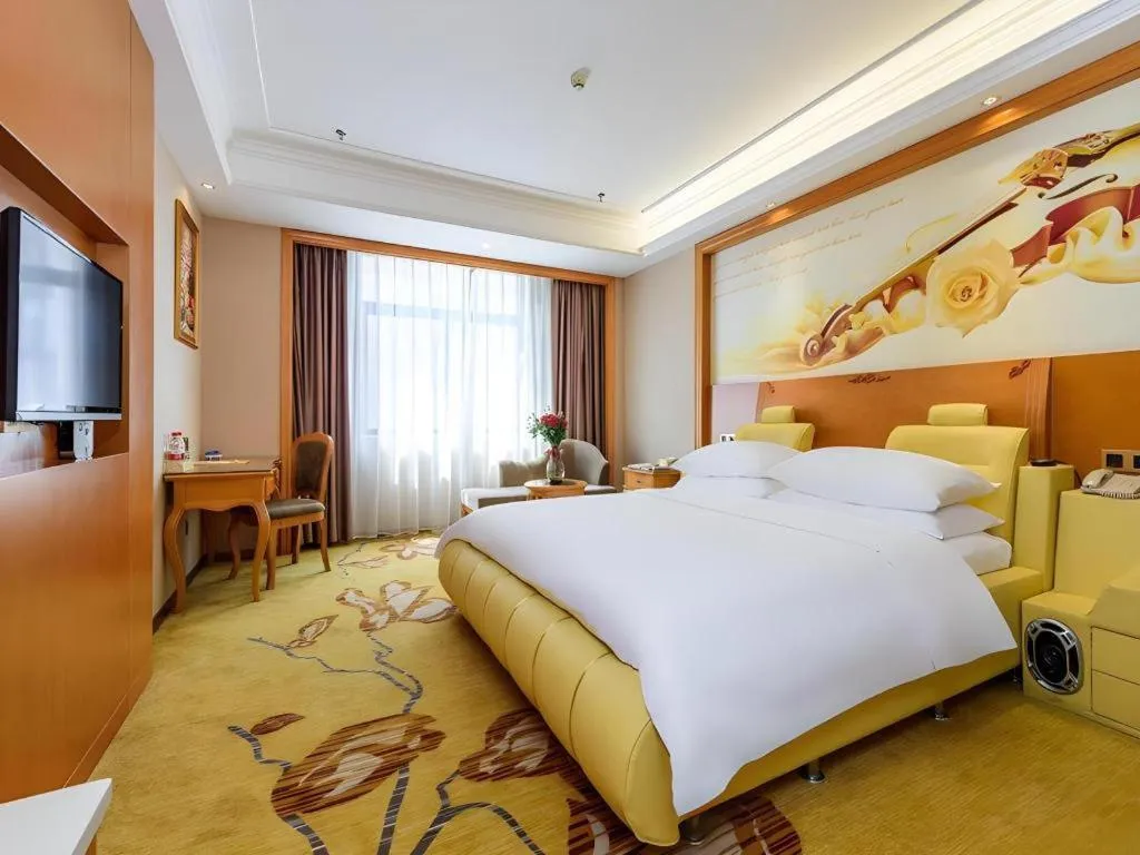 Bed in Vienna Hotel Nanning Anji Wanda 33rd Middle School Metro Station