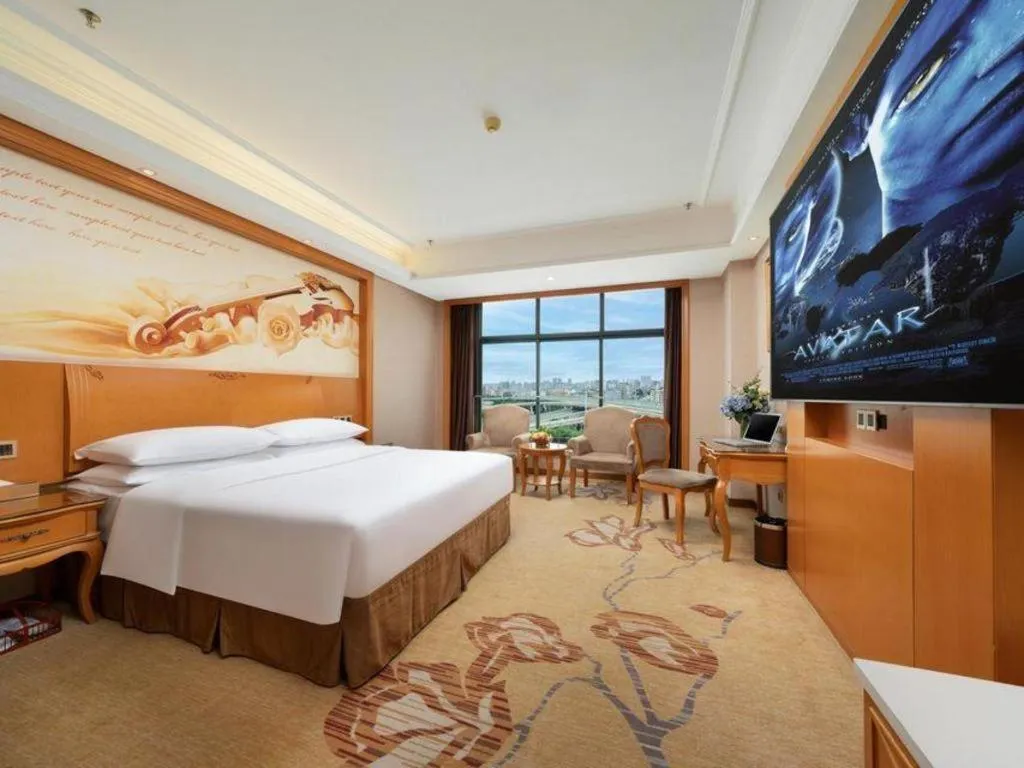 Bed in Vienna Hotel Nanning Anji Wanda 33rd Middle School Metro Station