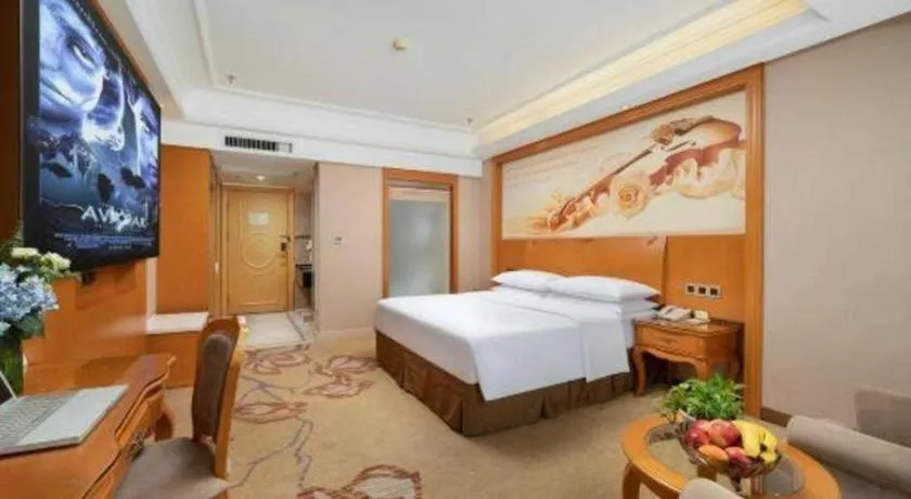 Bed in Vienna Hotel Nanning Anji Wanda 33rd Middle School Metro Station