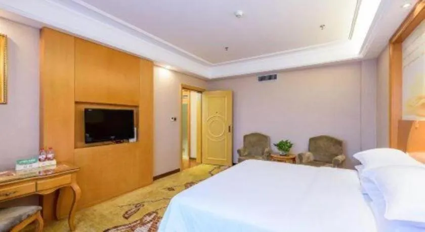 Bed in Vienna Hotel Nanning Anji Wanda 33rd Middle School Metro Station