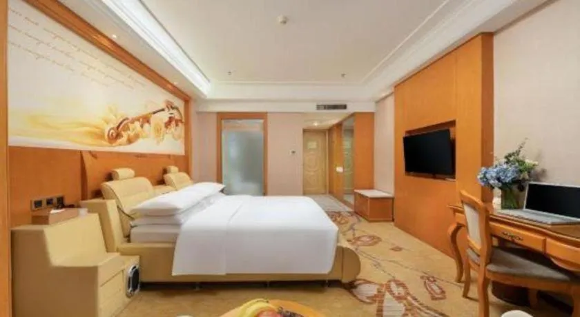 Bed in Vienna Hotel Nanning Anji Wanda 33rd Middle School Metro Station