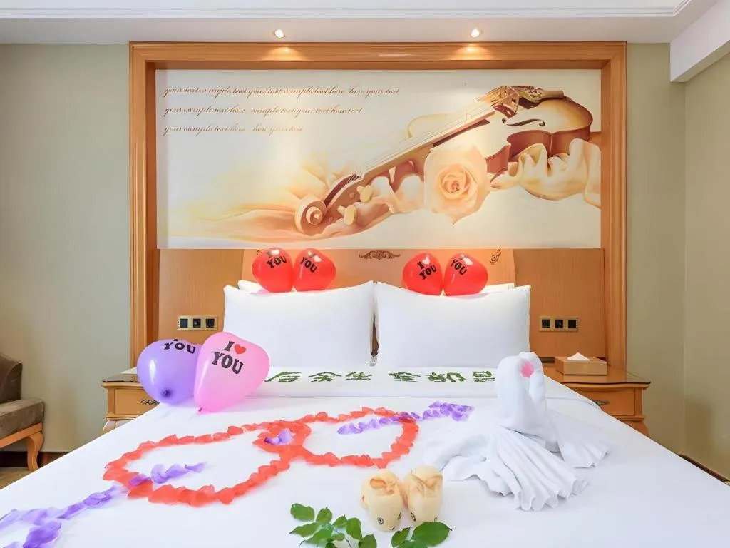 Bed in Vienna Hotel Nanning Anji Wanda 33rd Middle School Metro Station