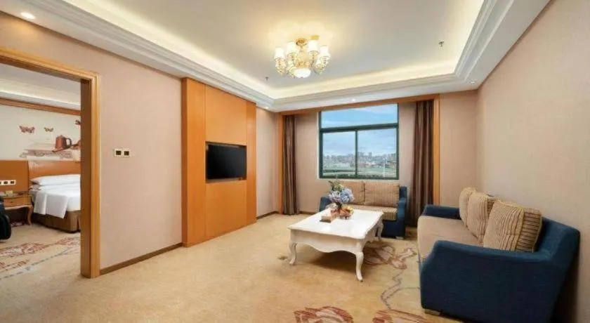 Bed in Vienna Hotel Nanning Anji Wanda 33rd Middle School Metro Station