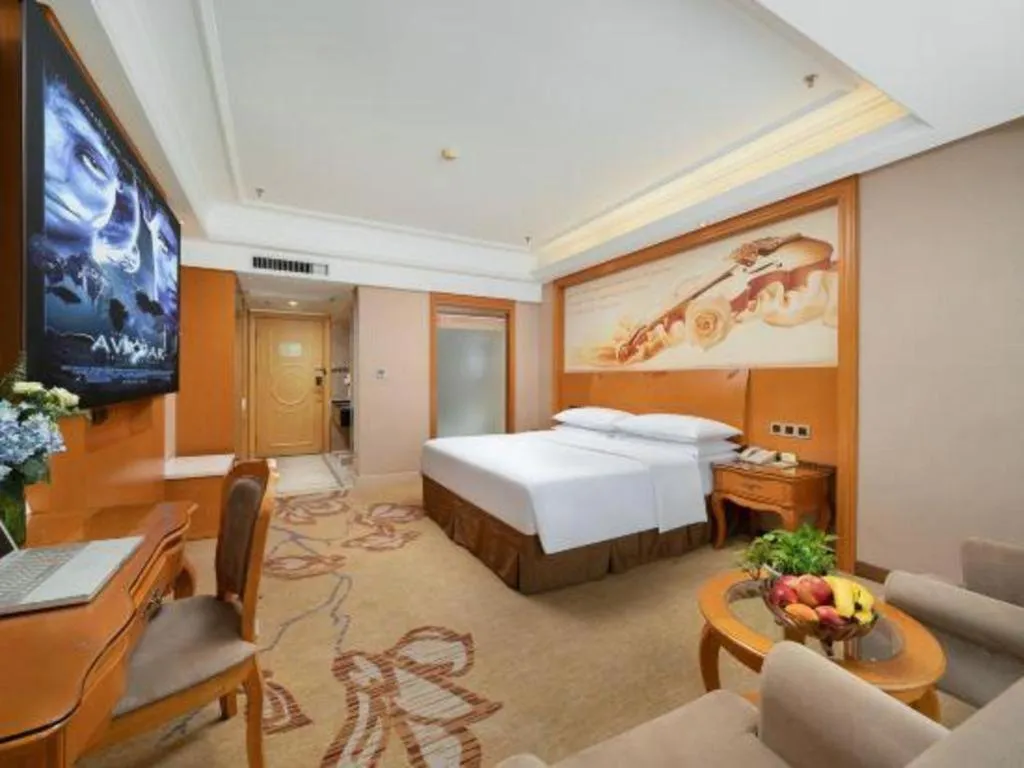 Bed in Vienna Hotel Nanning Anji Wanda 33rd Middle School Metro Station