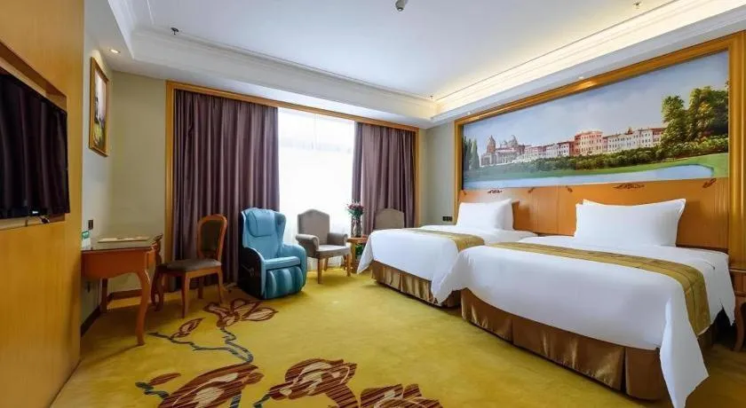 Bed in Vienna Hotel Nanning Anji Wanda 33rd Middle School Metro Station