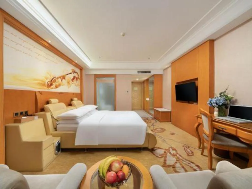 Bed in Vienna Hotel Nanning Anji Wanda 33rd Middle School Metro Station