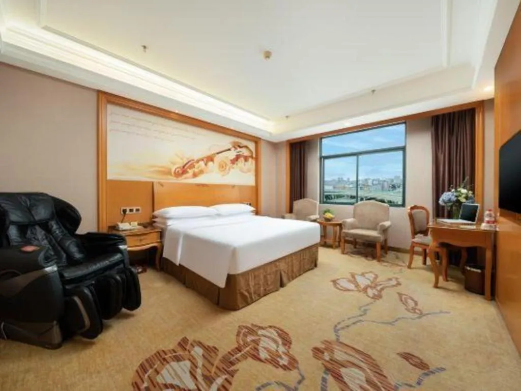 Bed in Vienna Hotel Nanning Anji Wanda 33rd Middle School Metro Station