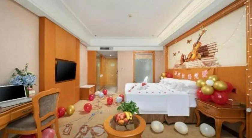 Bed in Vienna Hotel Nanning Anji Wanda 33rd Middle School Metro Station