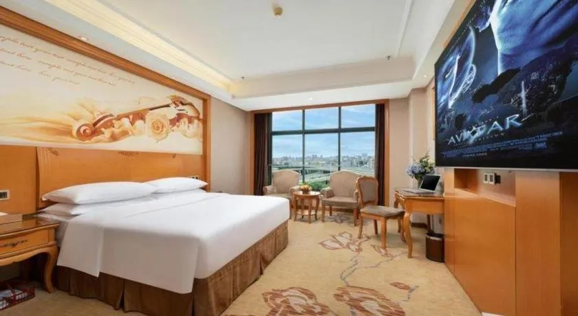 Bed in Vienna Hotel Nanning Anji Wanda 33rd Middle School Metro Station