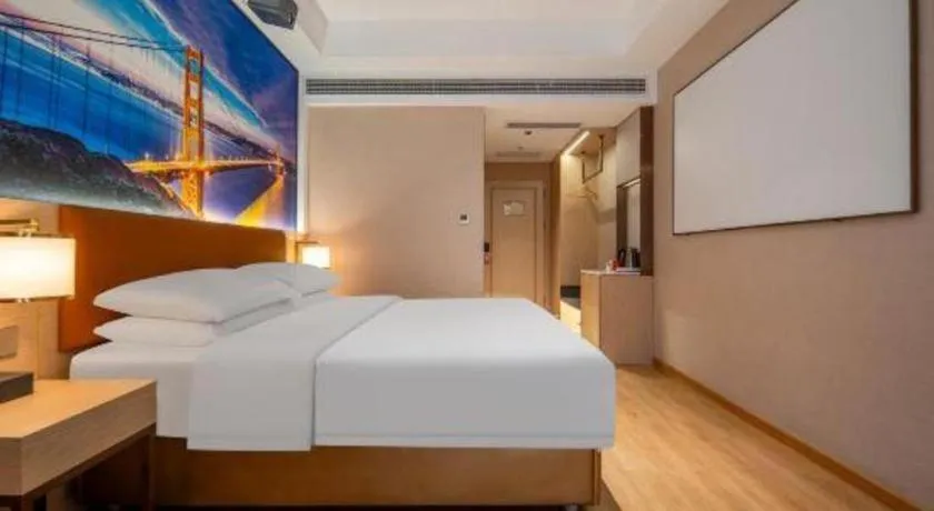 Bed in Vienna Hotel Wuhan Guobo Jiangang Metro Station